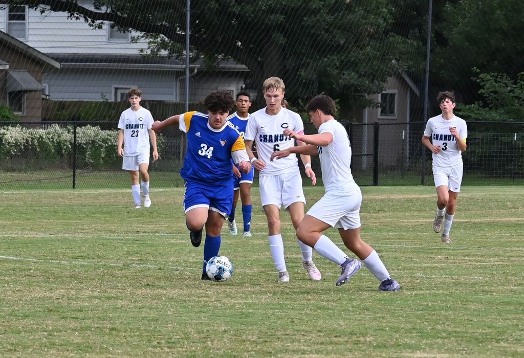PHS students play soccer against Chanute.