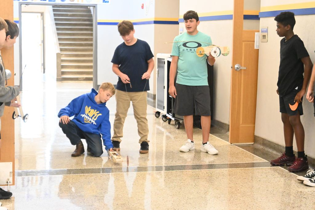 Students prepare to race their car.  They were 1st place under the three chances rule.