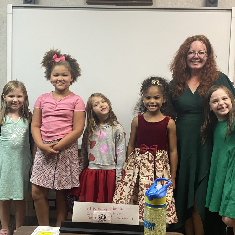 girls and teacher in dresses for dress up day