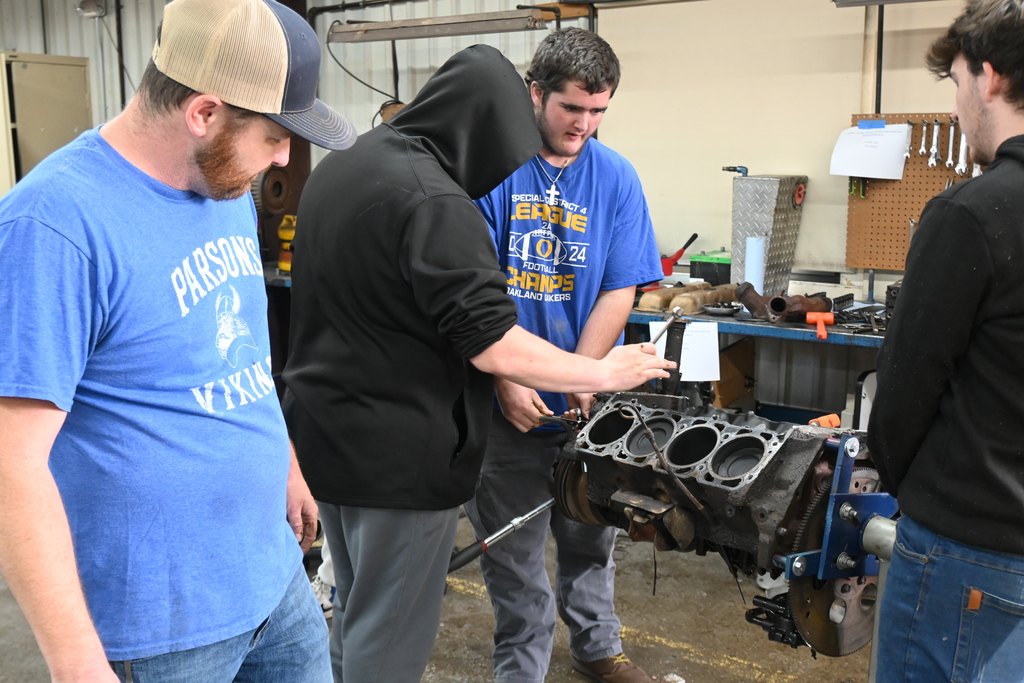 Students tear down a motor