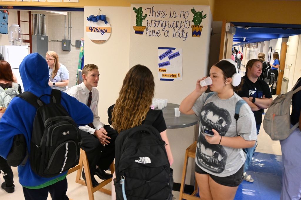 Students stop by to taste test the newest flavor of Italian soda.