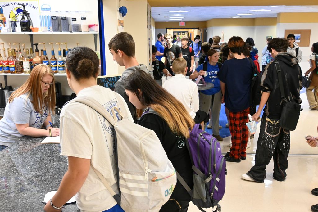 Students begin lining up to place orders.