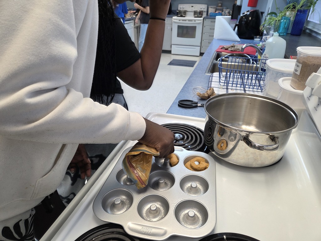 Filling donut pans