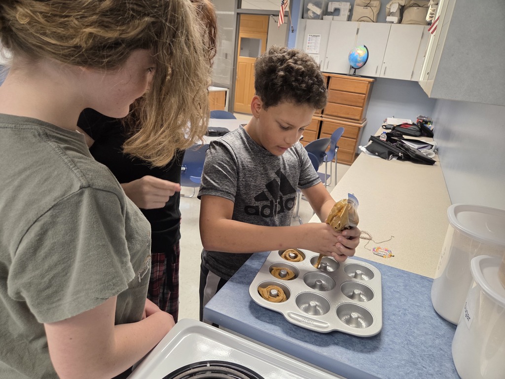 Filling donut pans