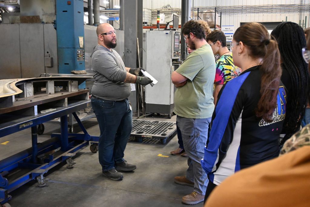 Students see the complicated specs that come in for making parts.