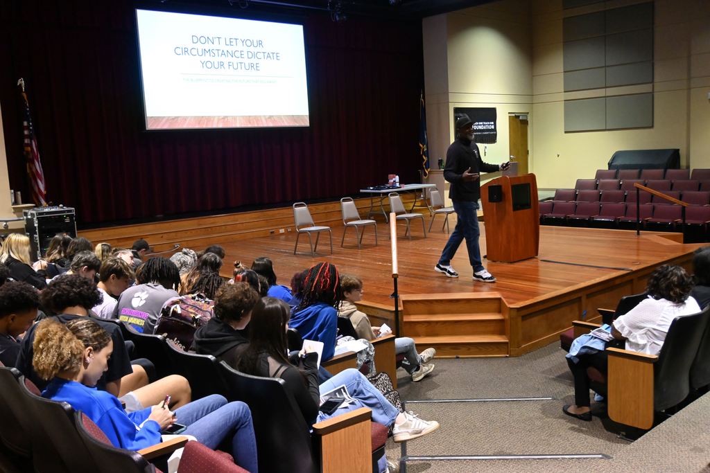 Reliford speaks to students about not letting their circumstances dictate their future.