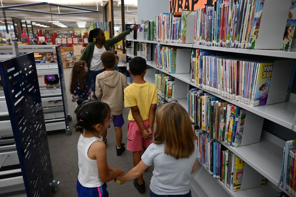 Students talk about what books they are finding.