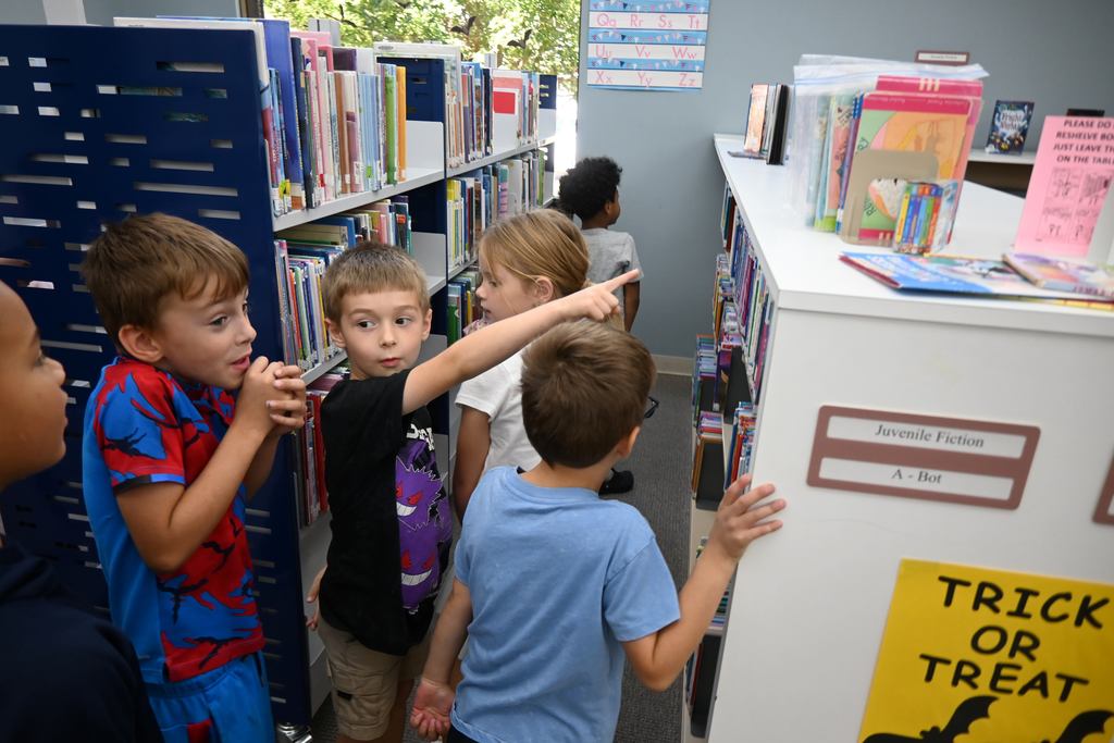 Students talk about what books they are finding.
