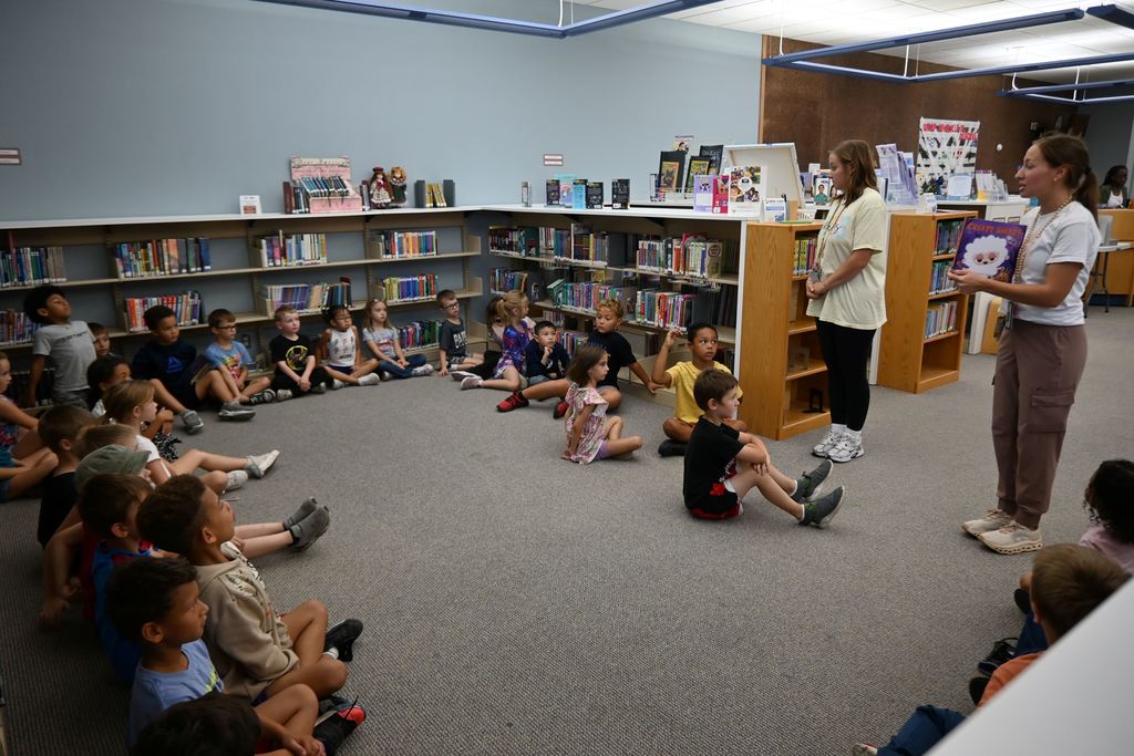 Mrs. Hutley tests students' knowledge on the parts of a book they learned at school.