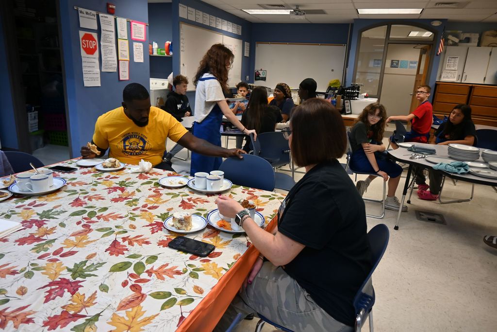Staff enjoys samplings of the teacher's soups and students' cinnamon rolls.