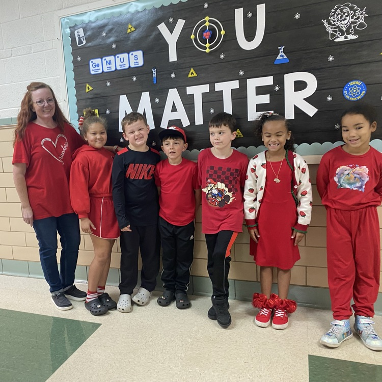A group all wearing red