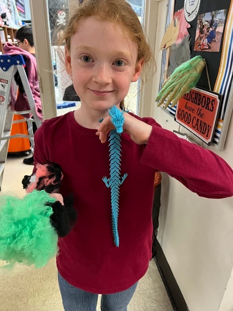 Student with their 3D print