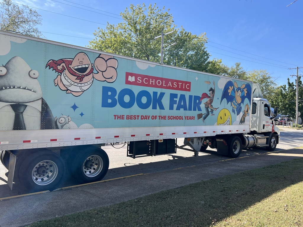 Book Fair material unloaded and in the library.
