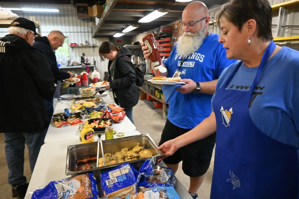 Bus monitors and drivers get lunch and Perkins explains there is plenty for seconds,