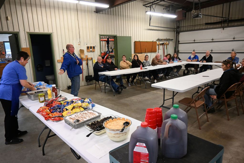 Rick Giefer explains the luncheon is the superintendent's way of showing her appreciation for her staff and all they do.