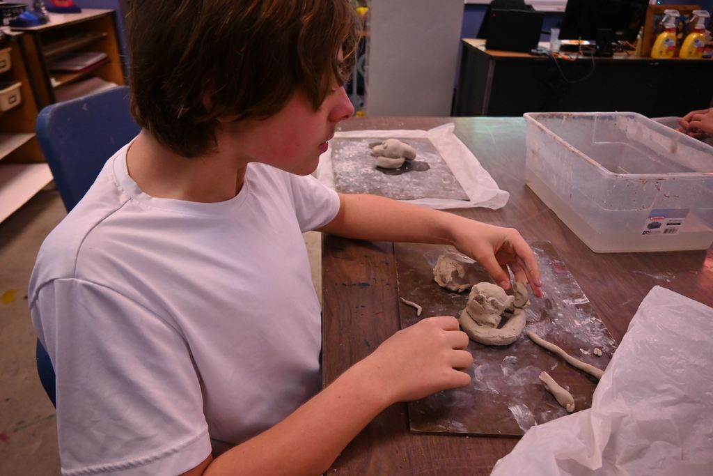 A student works on his dragon