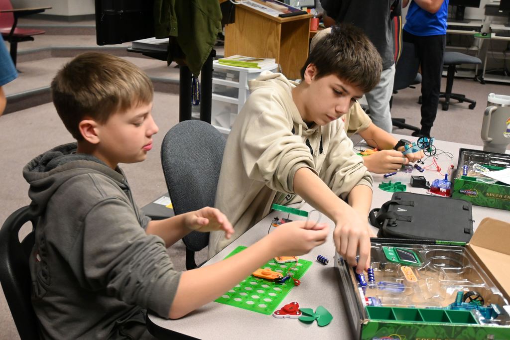 Students set up circuits tp play music and make things spin.