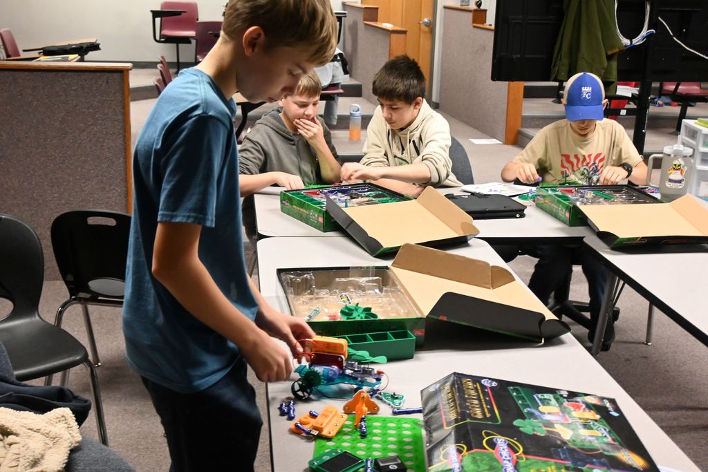 A student builds a motorized vehicle.