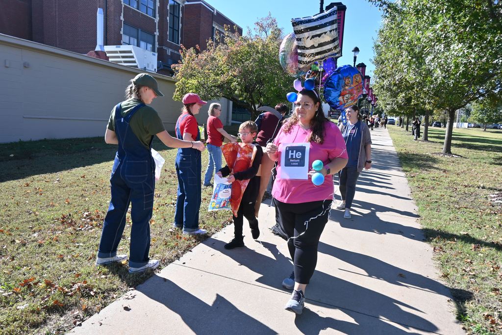 Teachers at Garfield dressed up as elements on the periodic table, like helium pictured here.
