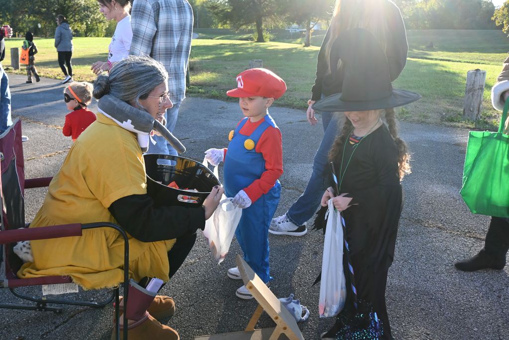 A crazy cat lady handed out candy.