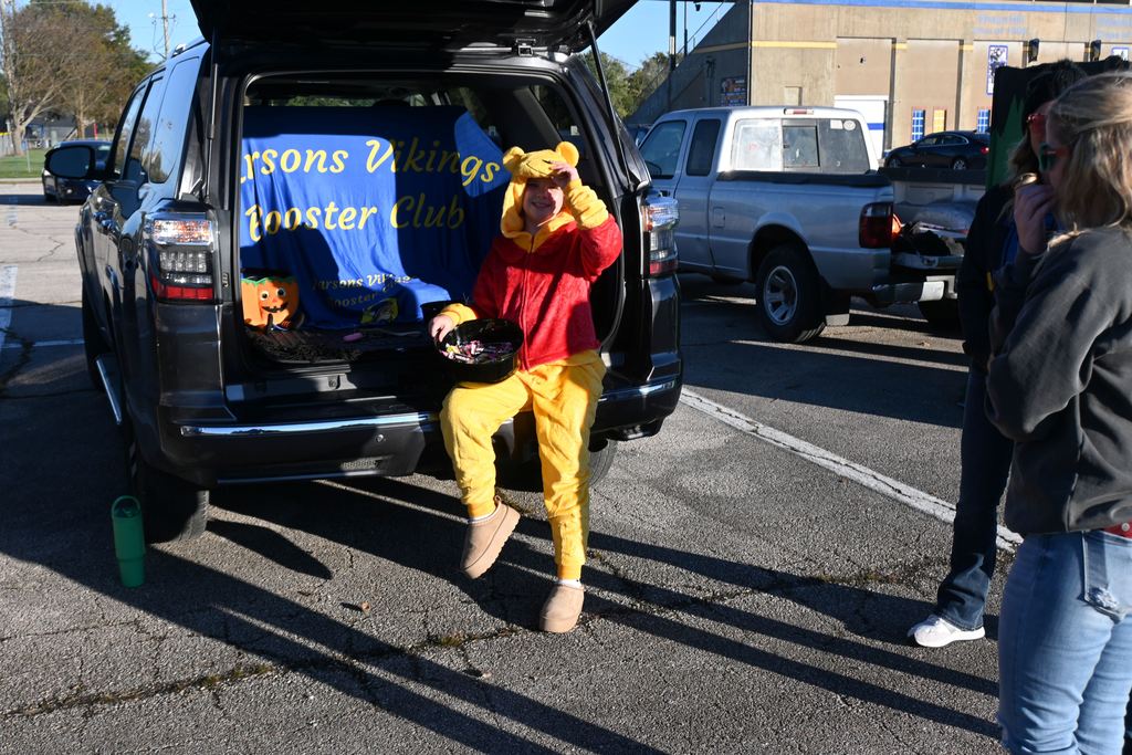Pooh Bear was ready to hand out candy from the Boosters.