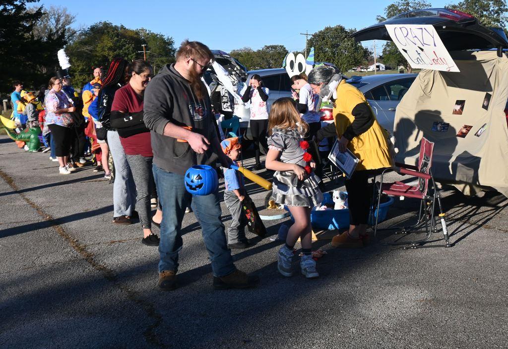 A crazy cat lady handed out candy.