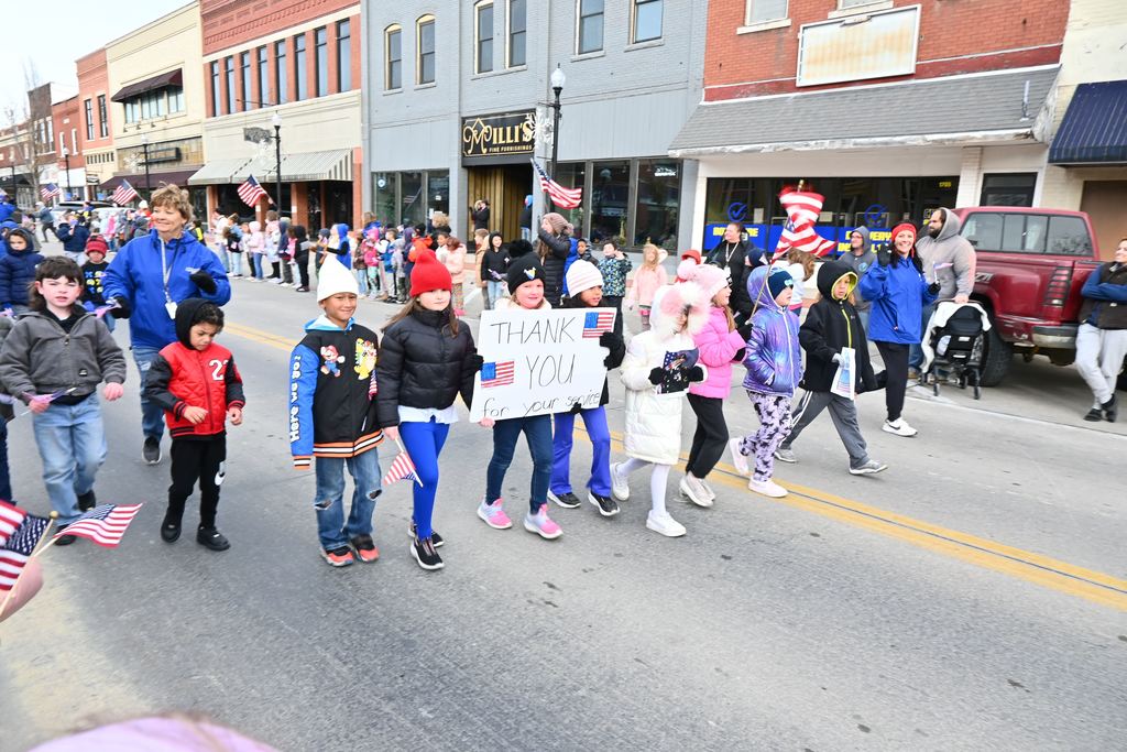 First Grade students from Lincoln walked in the Veterans Day Parade this year.