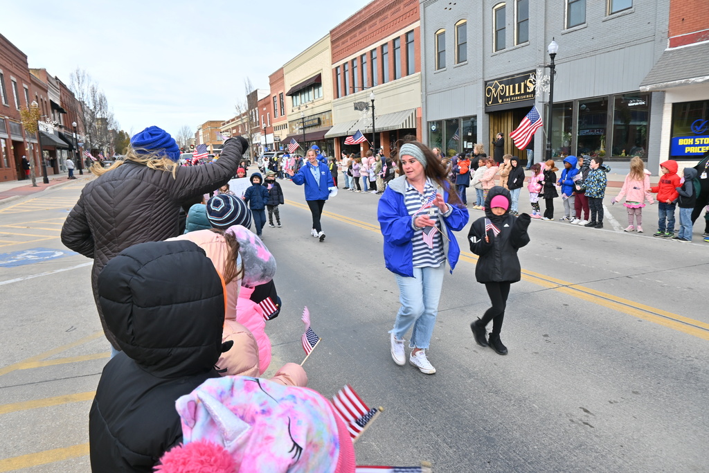 Lincoln first grade students and staff walk in the parade.