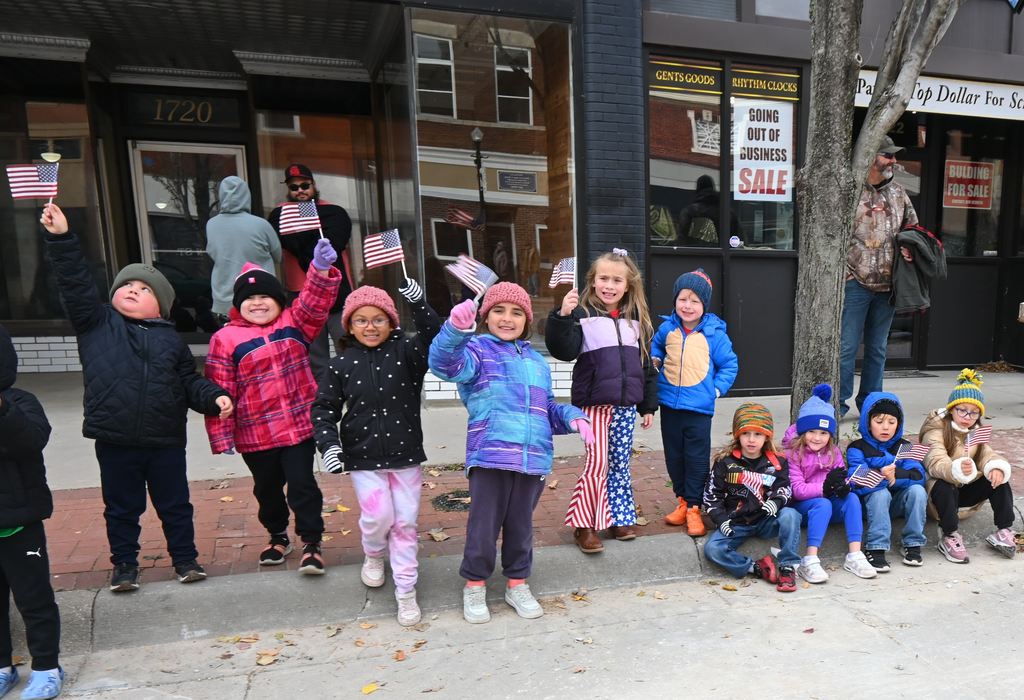 Garfield students wave their flags.