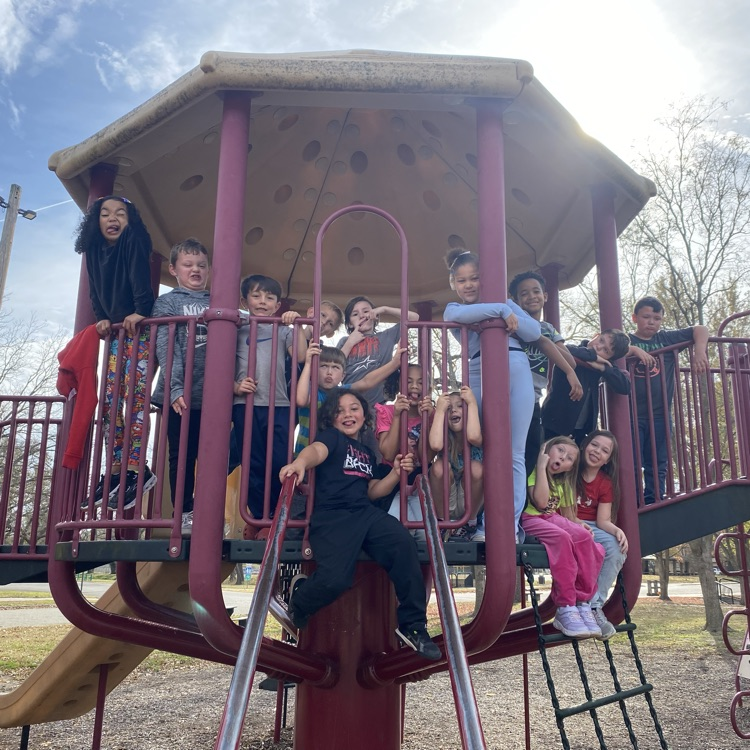 students posing at the park 