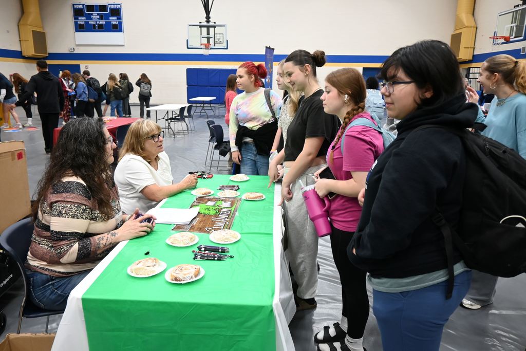 Students talk to reps of Elmhaven.