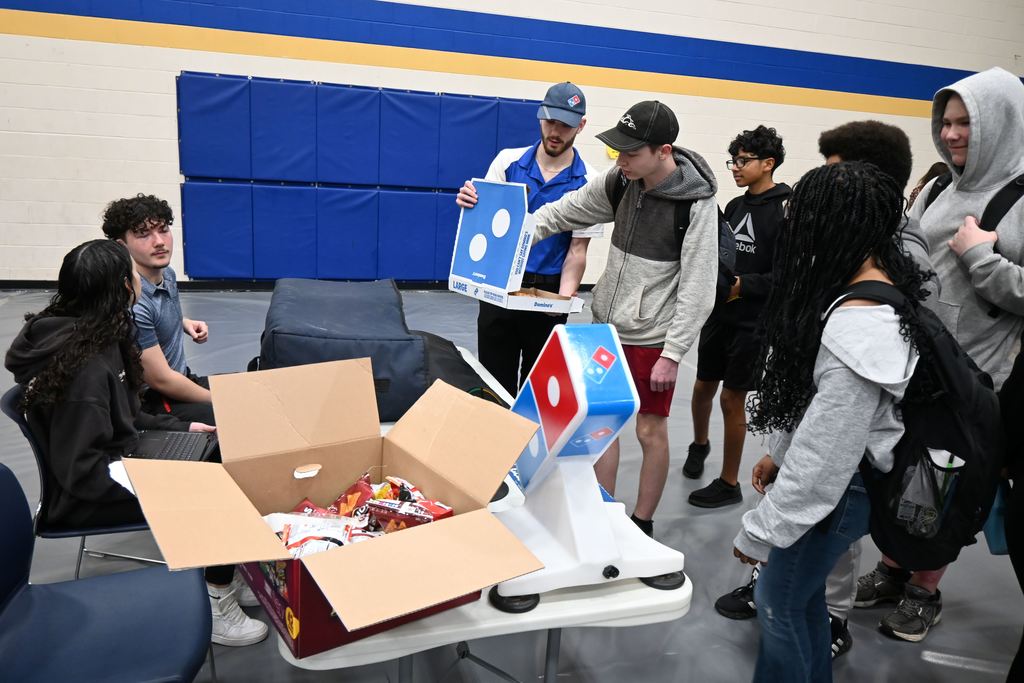 Students get free pizza from Dominos.