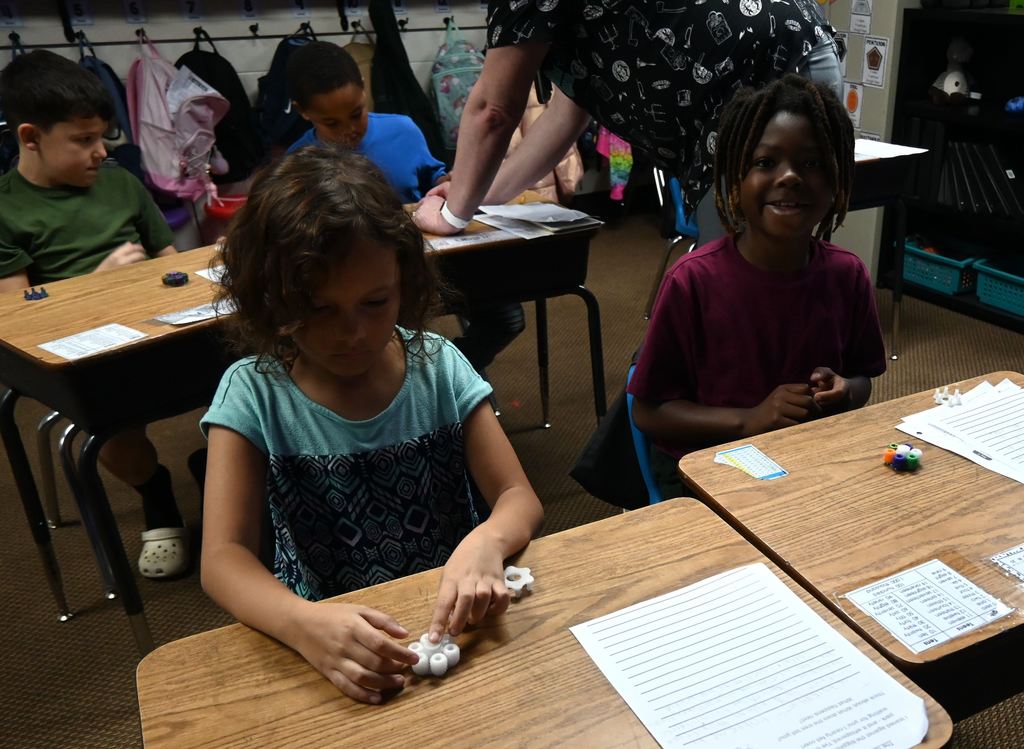 Students build their spinners.
