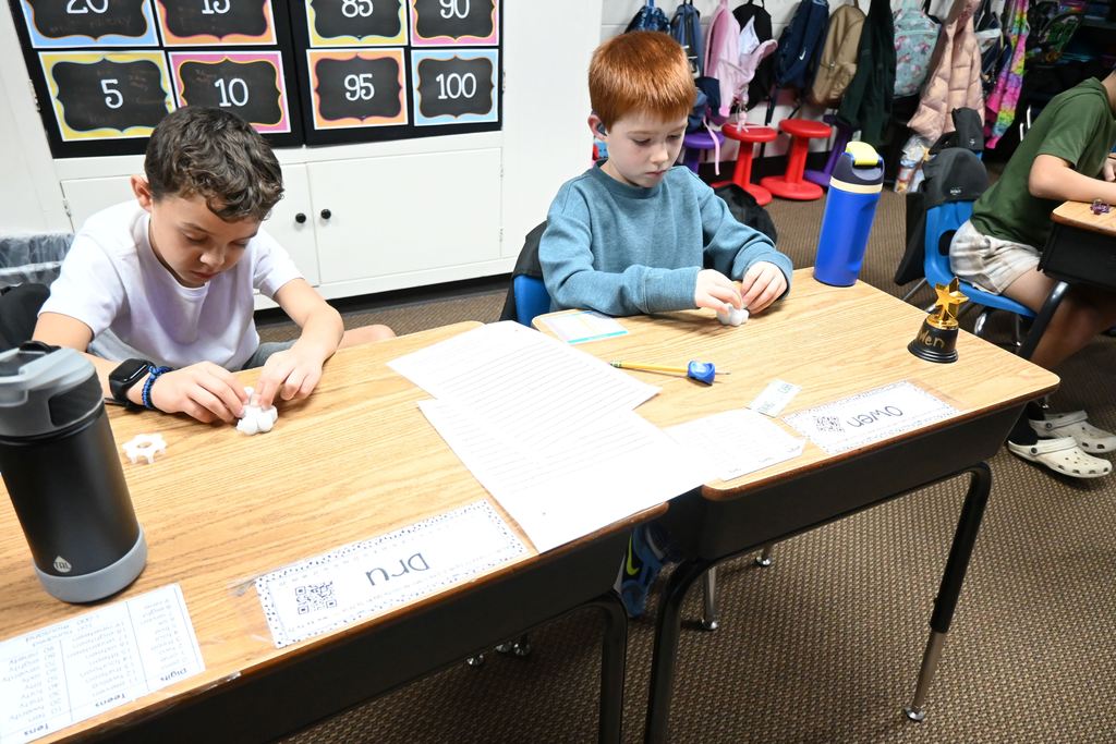 Students build their spinners.