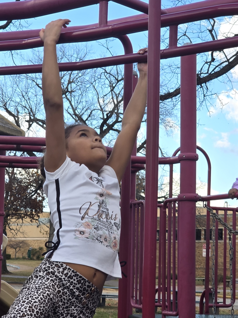 girl hanging on the pole