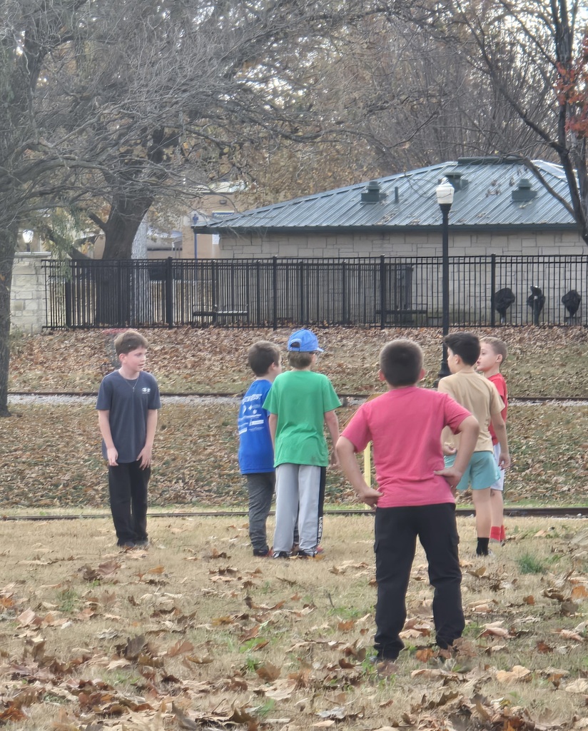 boys playing football