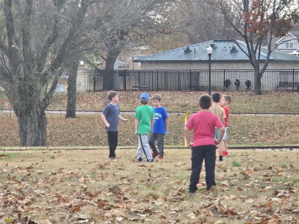 boys playing football