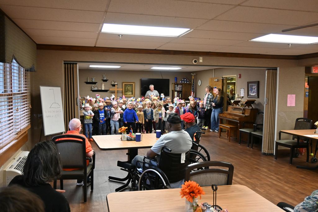 Kindergarten students sing to Good Sam residents.