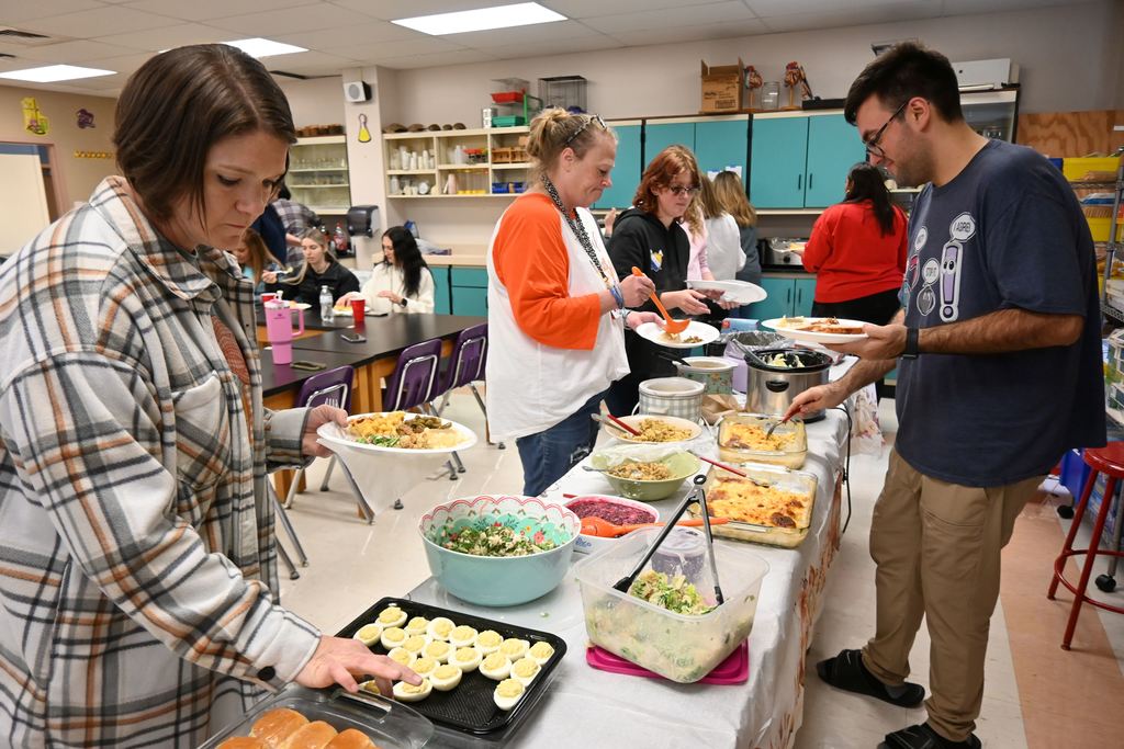 Guthridge staff enjoy a Thanksgiving dinner together.