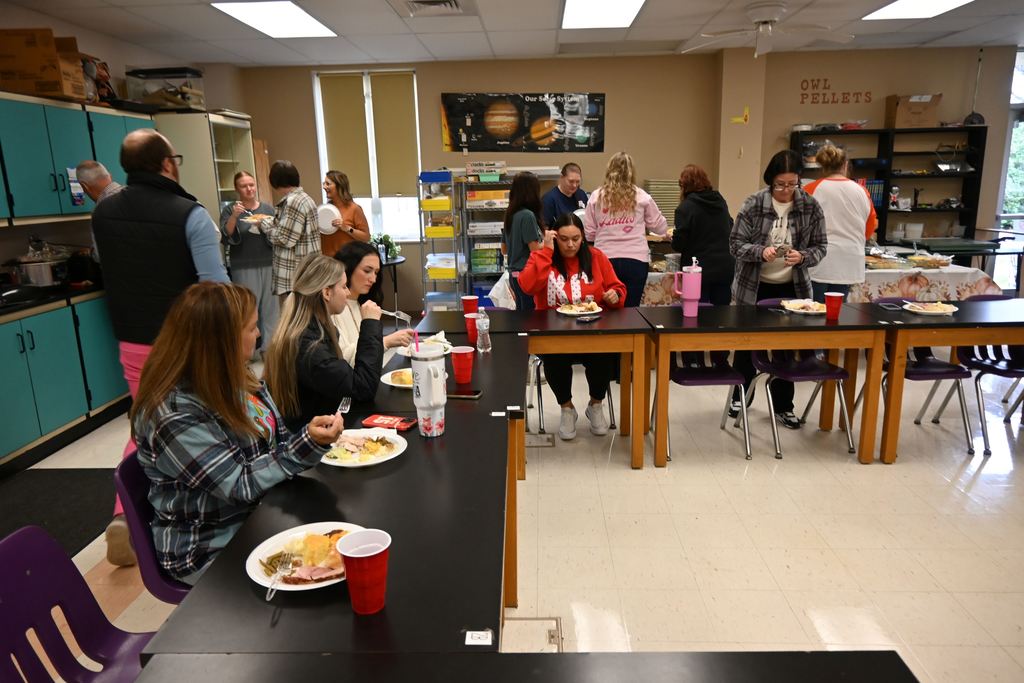 Guthridge staff enjoy a Thanksgiving dinner together.