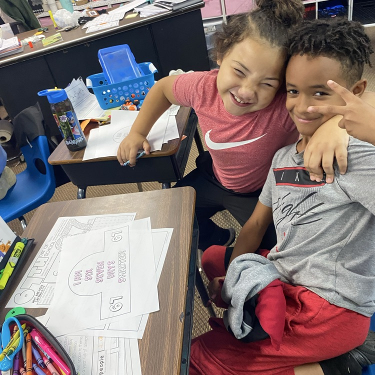 students coloring and posing