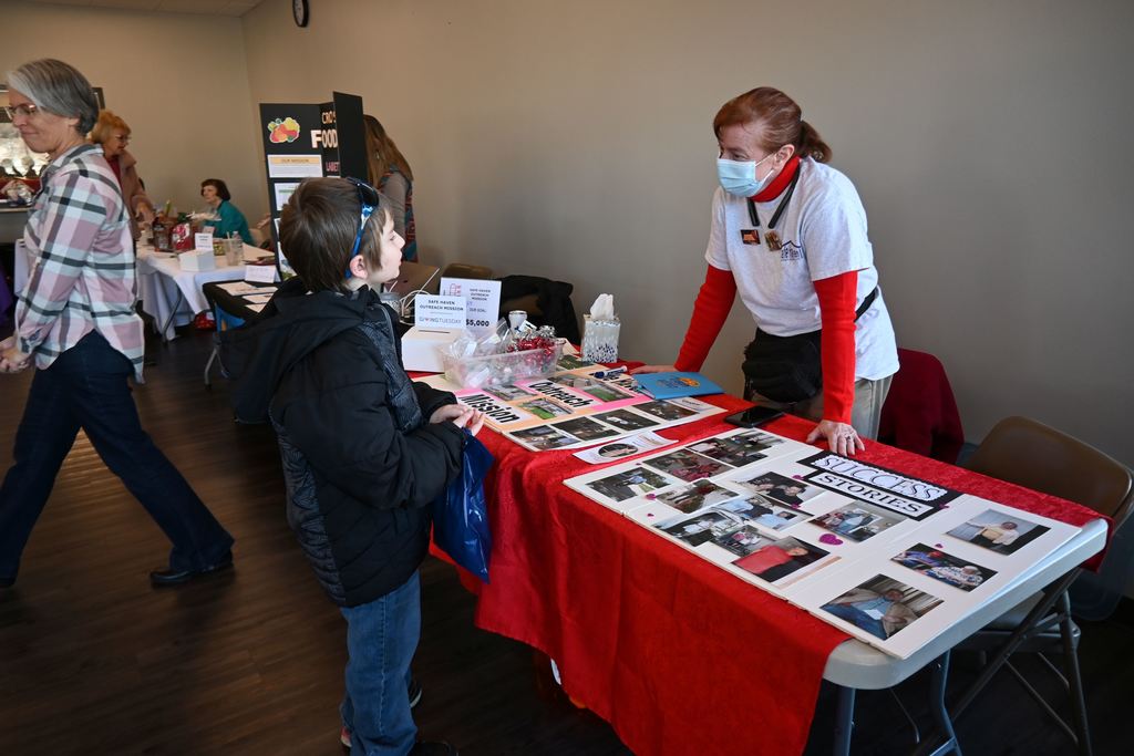 A student learns about the Safe Haven Outreach Mission.