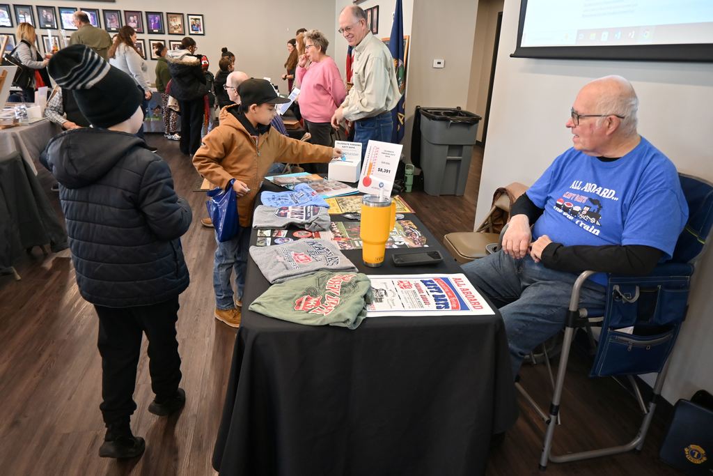 Students drop a ticket in to support Katy Days.