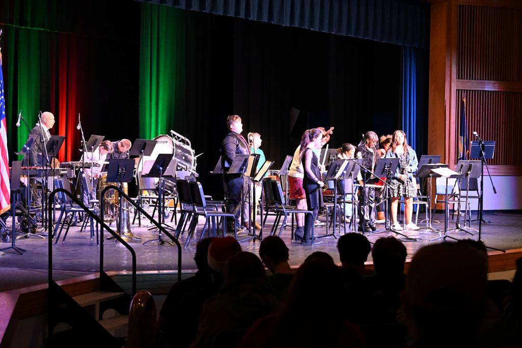Beginning Band students stand for applause after their performance.