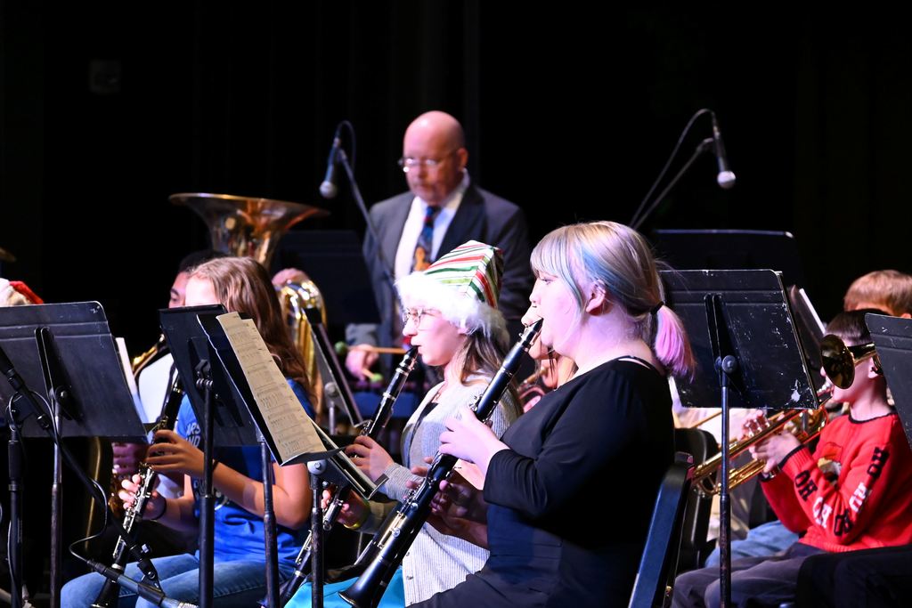 Parsons Middle School and Parsons High School Band students combined their talents to perform a couple of holiday numbers spreading Christmas cheer during the annual Christmas Concert Wednesday night.