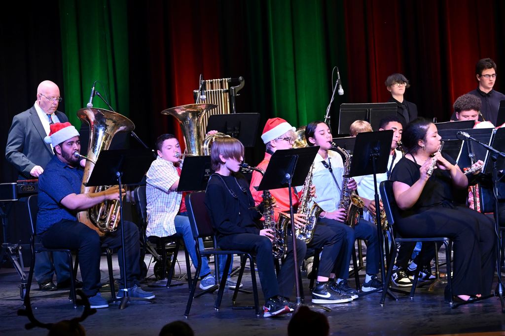 Parsons Middle School and Parsons High School Band students combined their talents to perform a couple of holiday numbers spreading Christmas cheer during the annual Christmas Concert Wednesday night.