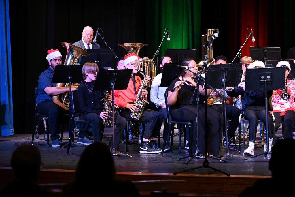 The combination middle school and high school bands play for the audience.