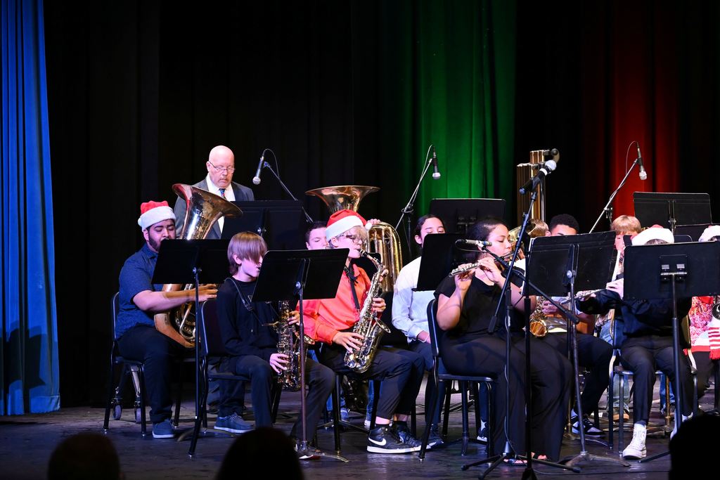 Parsons Middle School and Parsons High School Band students combined their talents to perform a couple of holiday numbers spreading Christmas cheer during the annual Christmas Concert Wednesday night.