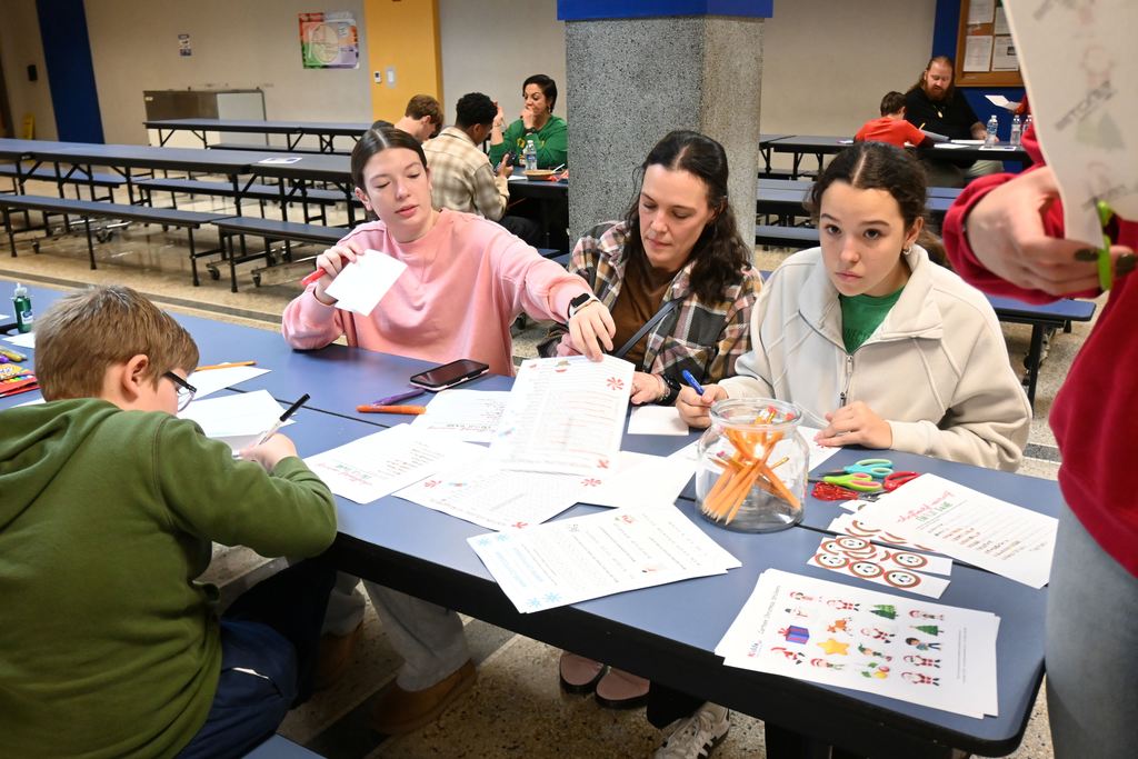 Families enjoy working on Word puzzles.