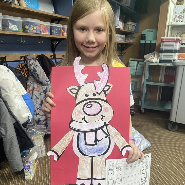 student showing off a math craftivity